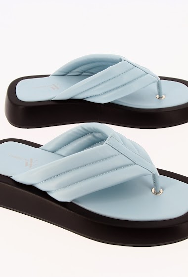 Pastel blue flip-flops with chunky sole
