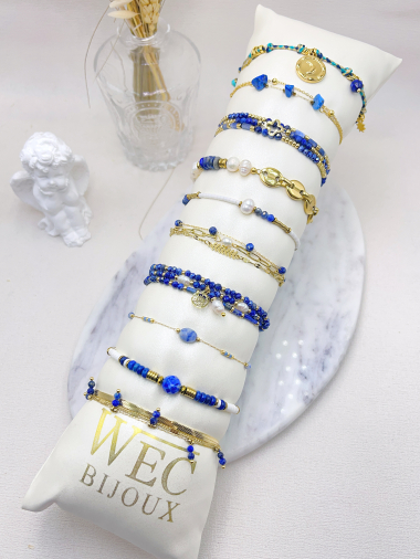 Großhändler WEC Bijoux - SET AUS 8 STAHLARMBÄNDERN MIT STEIN + PUDDING