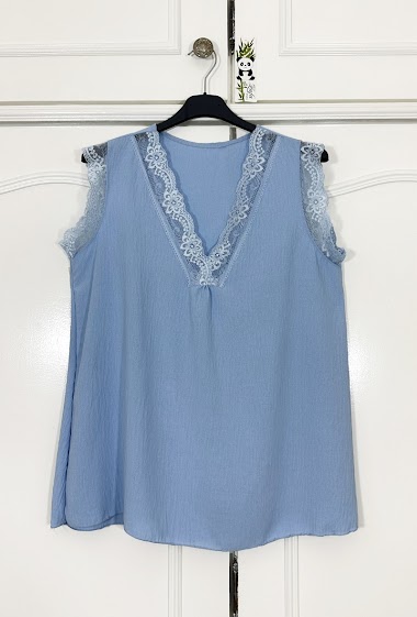 V-neck tank top topstitched with wide lace.